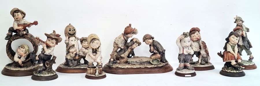 Collection of nine various Capodimonte figures by G Armani to include 'Gulliver's World' and other