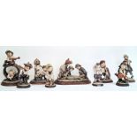 Collection of nine various Capodimonte figures by G Armani to include 'Gulliver's World' and other