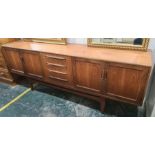 20th century G-Plan Fresco teak sideboard with four central drawers flanked by pair of cupboard