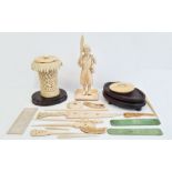 Small collection of antique carved ivory to include standing male figure with broad bladed knife,