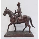 Bronze sculpture of huntsman wearing top hat, on horse, on rectangular stepped bronze base,