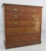 Early 20th century chest of two short over four long drawers with fluted decoration, plinth base,