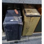 Large vintage travelling suitcase and another containing assorted table and other linen (2)