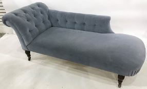 Victorian chaise longue with blue buttonback velour upholstery, turned supports to castors