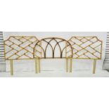 Pair of light stained bamboo single headboards and another (3)