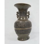 19th century Chinese green glazed vase with an ovoid body and decorated with Greek Key motif, with