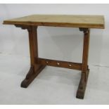 Early 20th century pine table, the rectangular top on trestle-style base, 88cm x 62cm