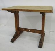 Early 20th century pine table, the rectangular top on trestle-style base, 88cm x 62cm