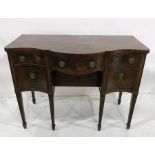 Circa 1800 mahogany serpentine-front sideboard, the plain top above central bowfronted drawer and