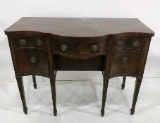 Circa 1800 mahogany serpentine-front sideboard, the plain top above central bowfronted drawer and