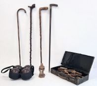 Set of four wooden bowls in carry case, a collection of five walking canes, one with silver