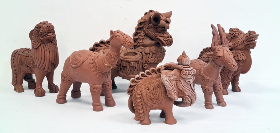 Collection of six various terracotta and glazed pottery model animals to include stylised