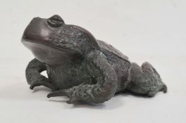 Bronze model of a crouching toad, 18cm wide