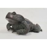 Bronze model of a crouching toad, 18cm wide