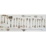 Set of eight silver coffee spoons with floral handles, flower labelled to handle 'Roosje', '