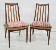 Set of four 20th century teak boardroom chairs with cream-coloured upholstered seats (4)