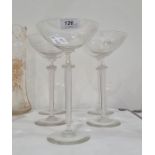 Five modern stemmed saucer champagnes with frilled knop and tapering multiple air twist stem