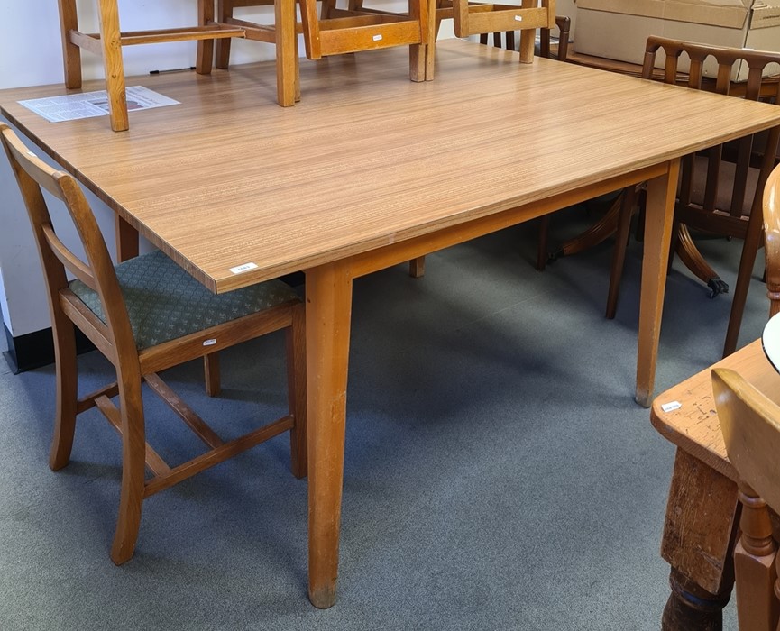 Large melamine topped rectangular table on beech supports, top - 152 x 122 cm