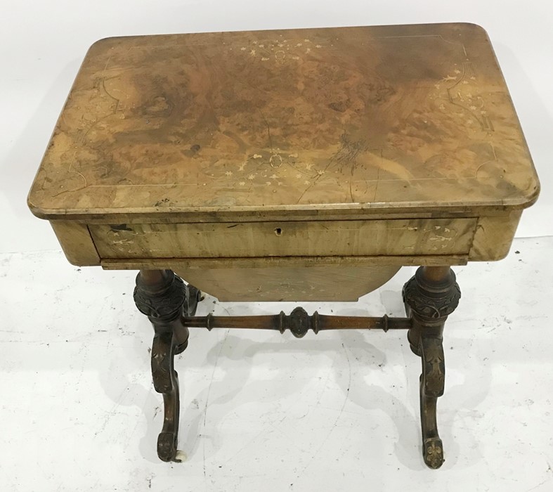 Early Victorian figured walnut and inlaid sewing table, the rectangular top with rounded corners