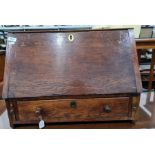 20th century oak stationary writing cabinet the rectangular top above the fall enclosing drawers,