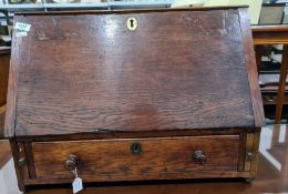 20th century oak stationary writing cabinet the rectangular top above the fall enclosing drawers,