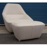 Modern Ligne Roset armchair with footstool, cream ground upholstery  Condition ReportThe chair and