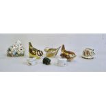 Three Royal Crown Derby birds, a Royal Crown Derby miniature pig, a Royal Crown Derby 'Exclusive