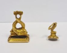 Georgian gold seal in the form of pair entwined dolphins and inset bloodstone intaglio carved with