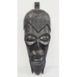 Large carved hardwood tribal mask of man, wall hanging, 94cm long