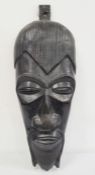 Large carved hardwood tribal mask of man, wall hanging, 94cm long