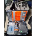 Two Inchcape cased car cleaning kits in canvas holdalls and a Garox emergency kit including high-viz