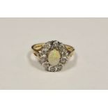 9ct gold, opal and white stone oval cluster ring Condition Reportsurface scratch to the opal