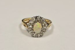 9ct gold, opal and white stone oval cluster ring Condition Reportsurface scratch to the opal