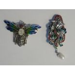 Silver, marcasite and plique a jour enamel dragonfly brooch, having facet cut white stone body and
