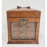 Victorian walnut jewellery box with hinged lid, fuschia padded interior, bevelled glass lockable