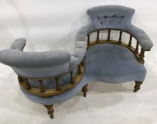 Victorian conversation chair, the two opposing seats in blue buttonback upholstery, turned
