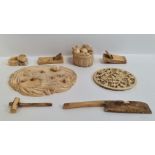 Small collection of antique Japanese carved ivory to include basket of fruit and other pieces on