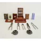 Collection of various metal nutcrackers, gramophone parts, a leather purse, miniature book of common