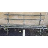 Wooden slatted wrought iron bench