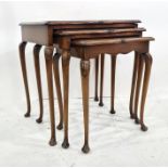 Nest of three 20th century walnut coffee tables with cabriole legs