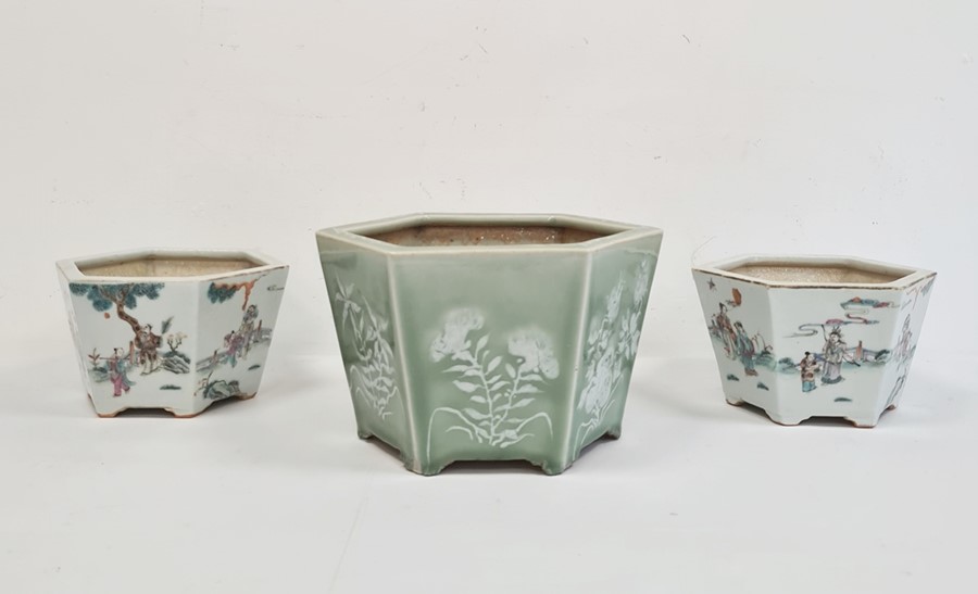 Pair of hexagonal 20th century Chinese jardinieres, the tapering bodies with each side decorated