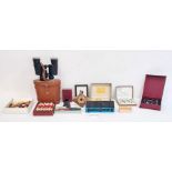 Pair of binoculars in leather case, a pocket chess and draughts, candle wax sealing set, dominoes,
