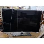 Samsung 40" flatscreen television with instructions and remote, model UE40D5000