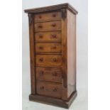 19th century Wellington chest of eight drawers, rectangular top with applied moulding to the