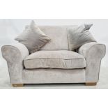 Three-seater sofa and wide armchair in pale silver upholstery (2)