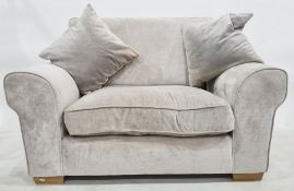 Three-seater sofa and wide armchair in pale silver upholstery (2)