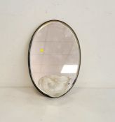 20th century oval glass wall mirror with moulded glass shell relief, 55cm x 16.5cm  Condition