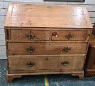 Late 19th/early 20th century pine bureau with two short over two long drawers, bracket feet, 101cm