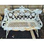 Intricately cast iron garden bench in the Coalbrookdale style, with pierced seat, the back decorated