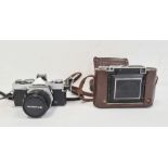Olympus OM-1 camera and a Zeiss Ikon Super Ikonta in brown leather case (2)  Condition